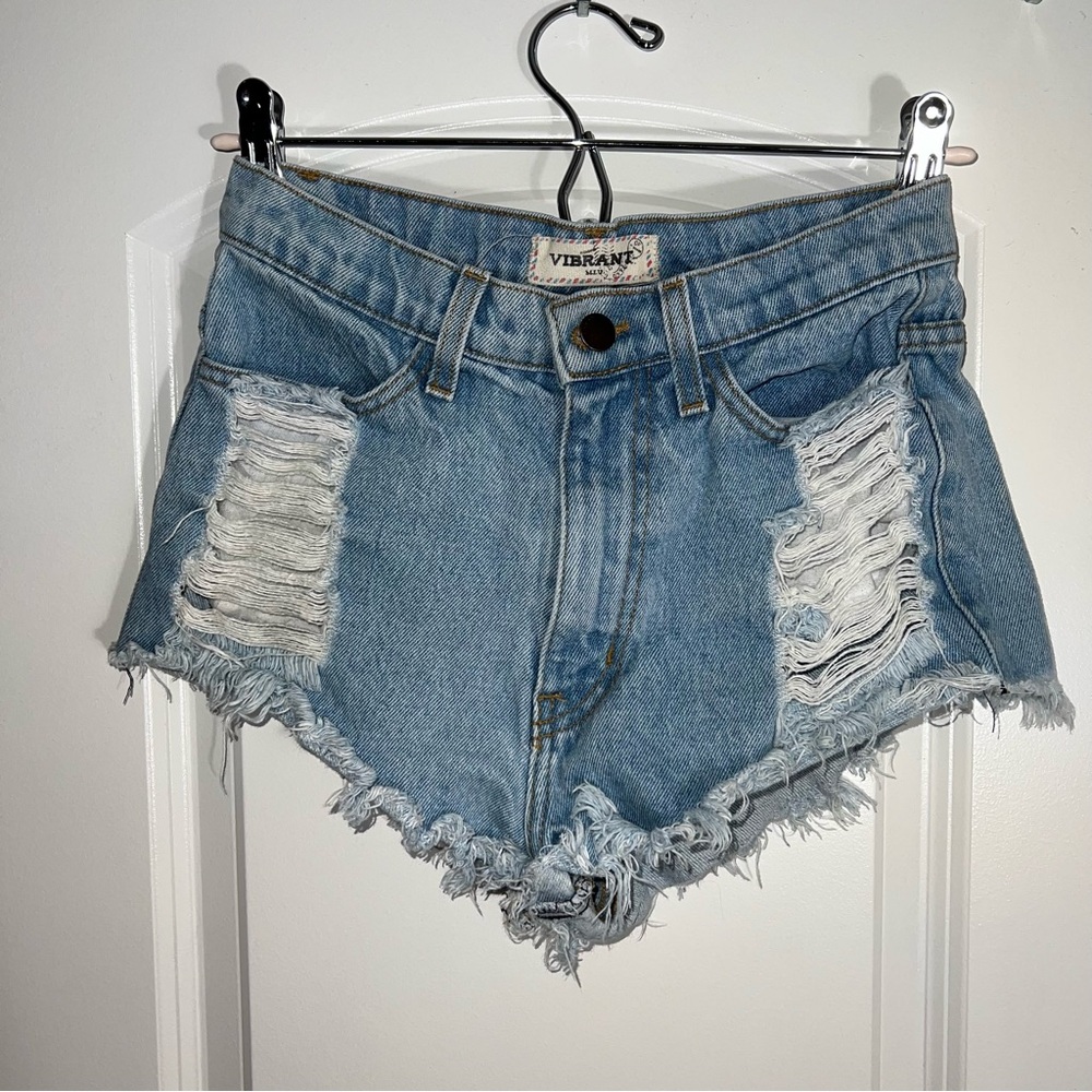 Vibrant High-Waisted Blue Jean Shorts with Distressed Detailing